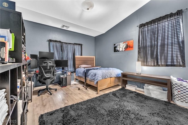 10654 Sidlaw Hills Ct, Las Vegas, NV 89141 - bedroom featuring lofted ceiling, wood finished floors, and an office area