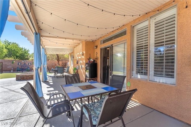 10654 Sidlaw Hills Ct, Las Vegas, NV 89141 - fenced backyard featuring outdoor dining space and a patio area