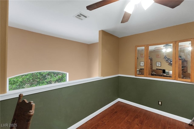 4415 Peaceful Harbor St, Las Vegas, NV 89129 - unfurnished room featuring ceiling fan and dark wood-type flooring