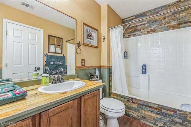 4415 Peaceful Harbor St, Las Vegas, NV 89129 - bathroom featuring tiled shower / bath combo, vanity, and wood finished floors