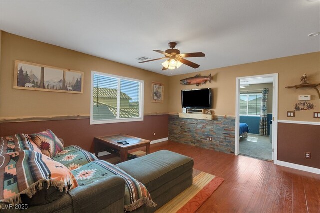 4415 Peaceful Harbor St, Las Vegas, NV 89129 - living area with healthy amount of natural light, wood finished floors, and ceiling fan