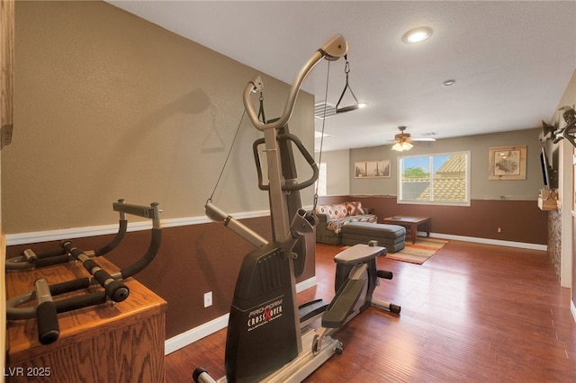 4415 Peaceful Harbor St, Las Vegas, NV 89129 - workout room featuring ceiling fan and wood finished floors