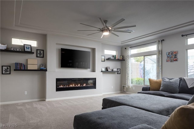 5976 Rockway Glen Ave, Las Vegas, NV 89141 - living room with ceiling fan, a glass covered fireplace, and carpet floors