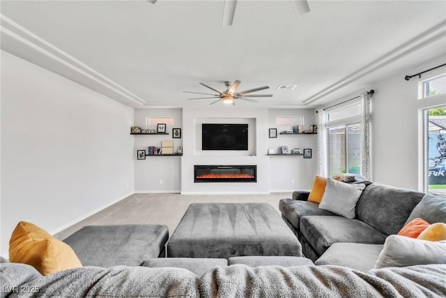 5976 Rockway Glen Ave, Las Vegas, NV 89141 - living area with a ceiling fan, carpet floors, and a glass covered fireplace
