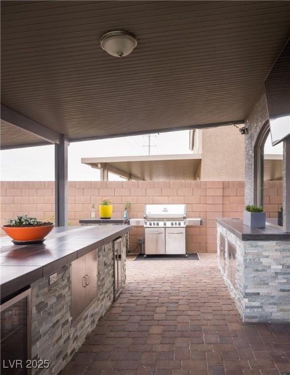 5976 Rockway Glen Ave, Las Vegas, NV 89141 - view of patio / terrace featuring an outdoor kitchen and beverage cooler