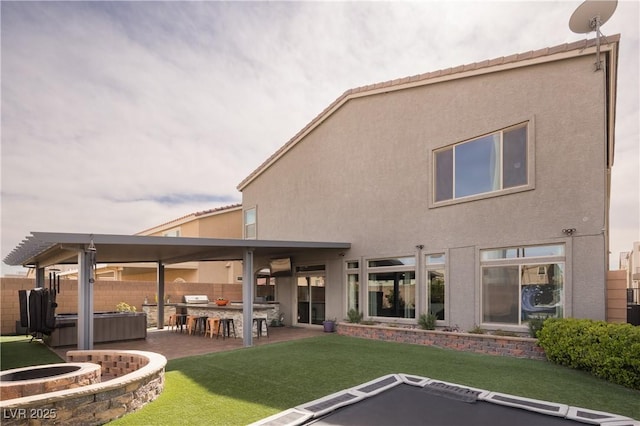 5976 Rockway Glen Ave, Las Vegas, NV 89141 - rear view of house with a patio, stucco siding, and a hot tub