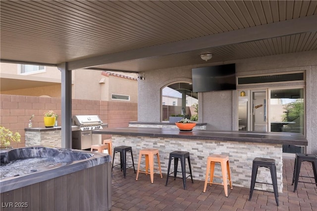 5976 Rockway Glen Ave, Las Vegas, NV 89141 - view of patio with area for grilling and a hot tub