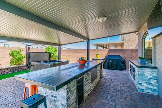 5976 Rockway Glen Ave, Las Vegas, NV 89141 - fenced backyard with area for grilling and a patio