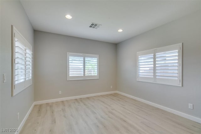 6085 Ryan Ranch Ave, Las Vegas, NV 89130 - unfurnished room featuring light wood finished floors and recessed lighting