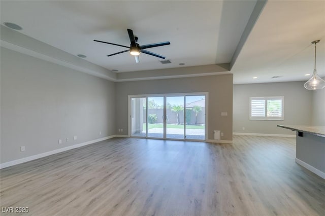 6085 Ryan Ranch Ave, Las Vegas, NV 89130 - unfurnished living room featuring ceiling fan, light wood-type flooring, and recessed lighting