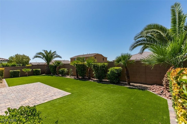 6085 Ryan Ranch Ave, Las Vegas, NV 89130 - fenced backyard featuring a patio area