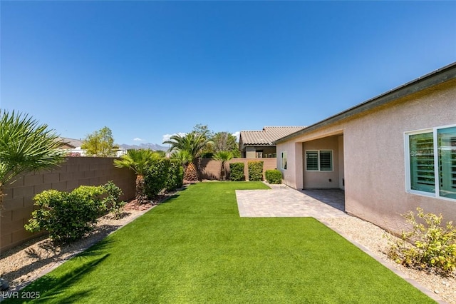 6085 Ryan Ranch Ave, Las Vegas, NV 89130 - fenced backyard featuring a patio