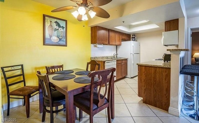 4200 S Valley View Blvd Unit 1077, Las Vegas, NV 89103 - dining space with ceiling fan and light tile patterned floors