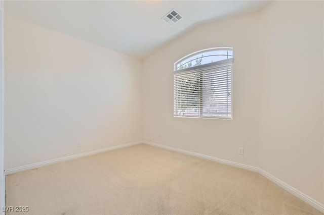 9252 Oxbow Lake Ave, Las Vegas, NV 89149 - empty room featuring light colored carpet and lofted ceiling
