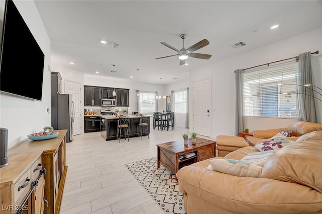 794 Sunny Sagebrush St, Henderson, NV 89011 - living area featuring a ceiling fan, recessed lighting, and light wood-type flooring