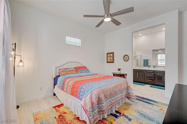 794 Sunny Sagebrush St, Henderson, NV 89011 - bedroom featuring multiple windows, ensuite bathroom, and wood finished floors