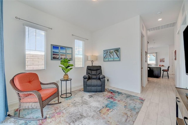 794 Sunny Sagebrush St, Henderson, NV 89011 - sitting room featuring baseboards and light wood-style flooring