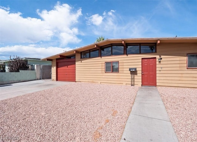 6112 Fairwood Cir, Las Vegas, NV 89107 - view of front of house with an attached garage and driveway