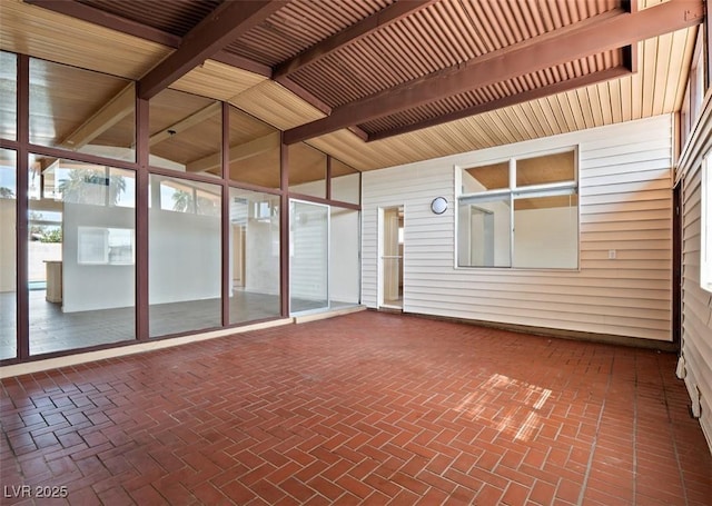 6112 Fairwood Cir, Las Vegas, NV 89107 - unfurnished sunroom with beam ceiling