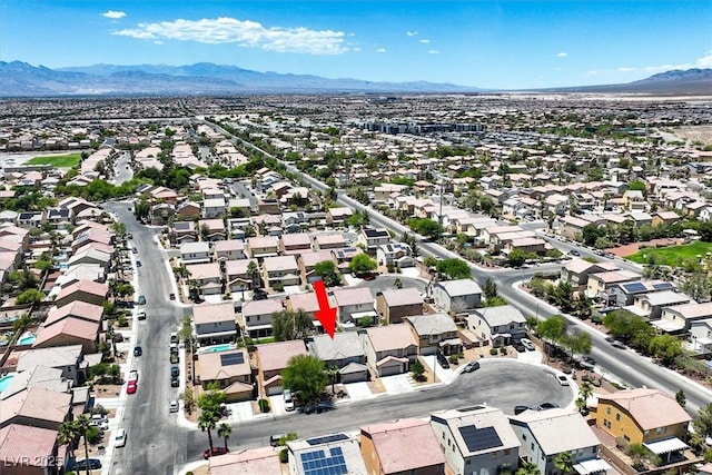 6133 Roseboro Ct, North Las Vegas, NV 89081 - aerial view of property and surrounding area featuring a mountainous background and nearby suburban area