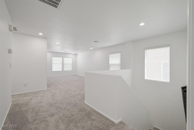 6133 Roseboro Ct, North Las Vegas, NV 89081 - hall featuring an upstairs landing, carpet, and recessed lighting