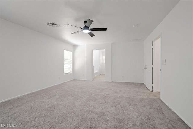 6133 Roseboro Ct, North Las Vegas, NV 89081 - unfurnished bedroom featuring light carpet and a ceiling fan