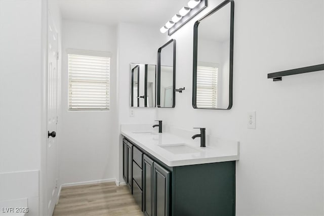 6133 Roseboro Ct, North Las Vegas, NV 89081 - bathroom with wood finished floors and double vanity