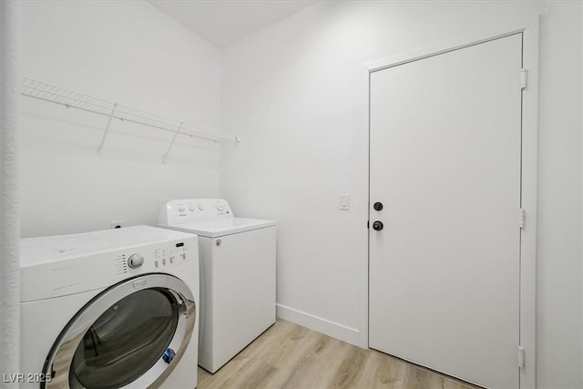 6133 Roseboro Ct, North Las Vegas, NV 89081 - laundry room with separate washer and dryer and light wood-type flooring