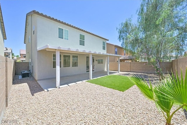 6133 Roseboro Ct, North Las Vegas, NV 89081 - rear view of property featuring a fenced backyard, stucco siding, and a patio area