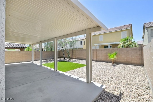 6133 Roseboro Ct, North Las Vegas, NV 89081 - fenced backyard with a patio area