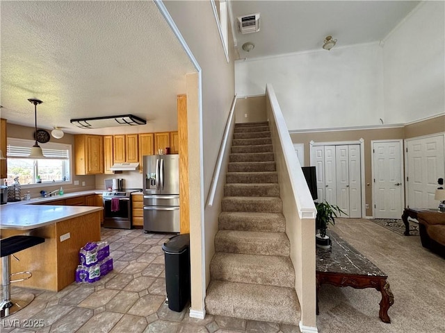 2345 Iron Dr, Ely, NV 89301 - stairs with a textured ceiling