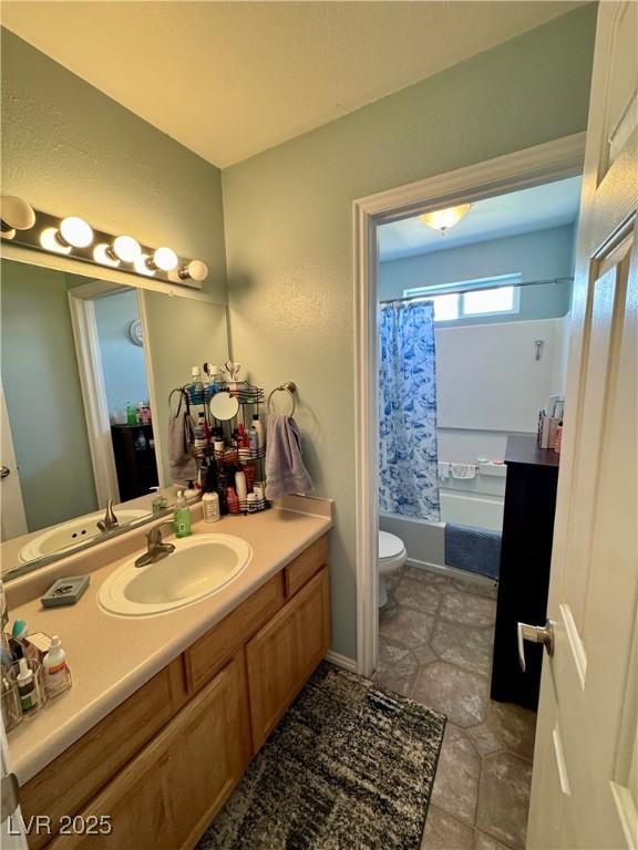 2345 Iron Dr, Ely, NV 89301 - bathroom with vanity, shower / bath combo, and tile patterned floors