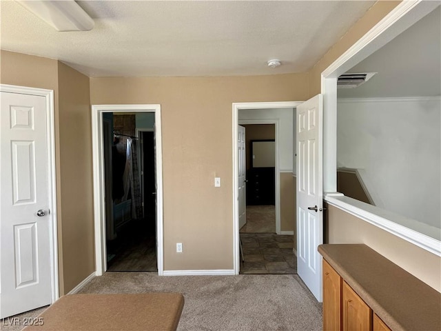 2345 Iron Dr, Ely, NV 89301 - unfurnished bedroom with light carpet and ensuite bath