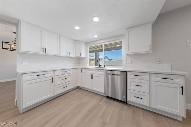 1511 Irene Dr, Boulder City, NV 89005 - kitchen featuring dishwasher, light wood-style floors, white cabinetry, and recessed lighting