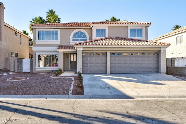 9541 Summersweet Ct, Las Vegas, NV 89123 - mediterranean / spanish-style home with stucco siding, driveway, an attached garage, and a tiled roof