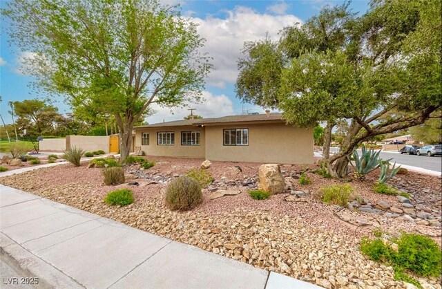 3597 Cochise Ln, Las Vegas, NV 89169 - view of front facade featuring stucco siding