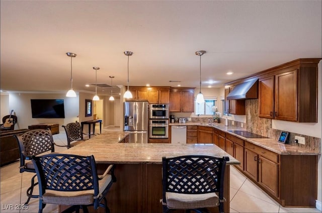 3597 Cochise Ln, Las Vegas, NV 89169 - kitchen with appliances with stainless steel finishes, range hood, light tile patterned flooring, light stone counters, and a breakfast bar