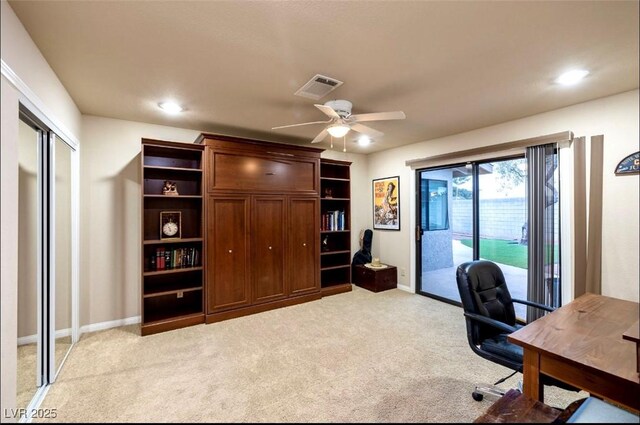3597 Cochise Ln, Las Vegas, NV 89169 - home office with a ceiling fan, light carpet, and recessed lighting