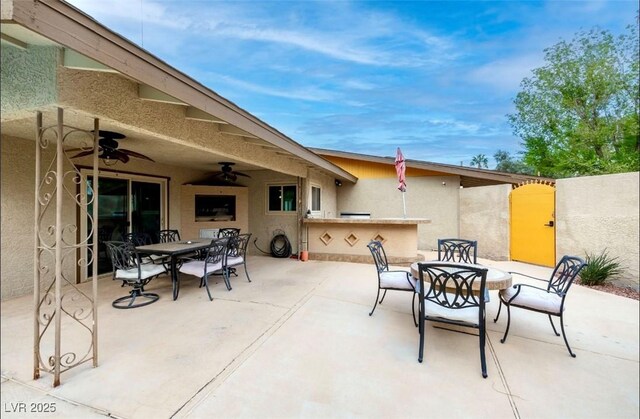 3597 Cochise Ln, Las Vegas, NV 89169 - view of patio / terrace with outdoor dining space and a ceiling fan
