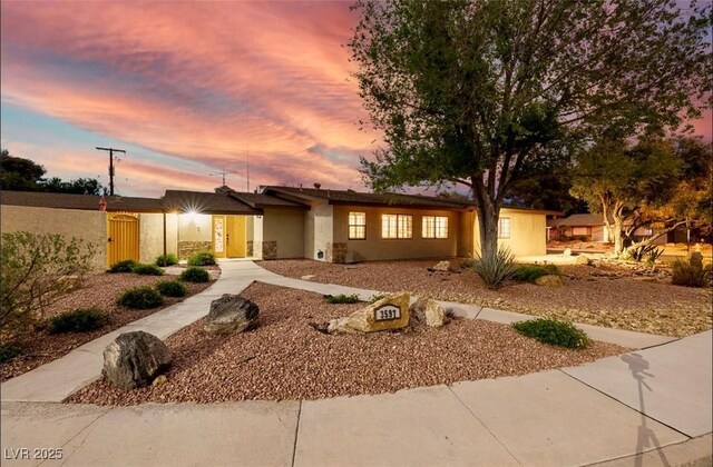 3597 Cochise Ln, Las Vegas, NV 89169 - view of front facade with stucco siding