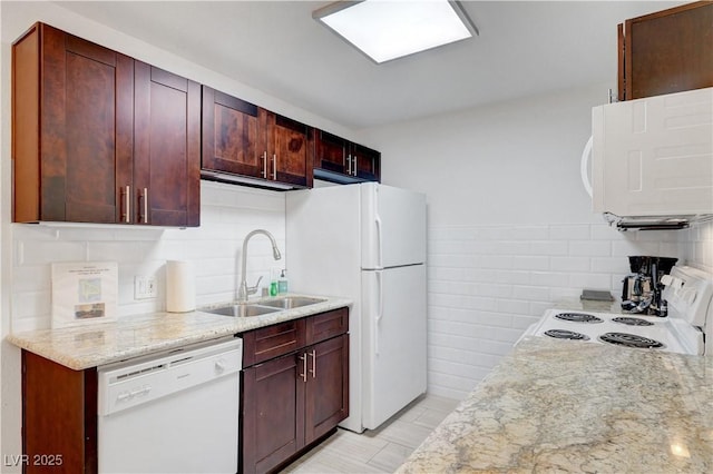 4200 S Valley View Blvd Unit 2009, Las Vegas, NV 89103 - kitchen with white appliances, light stone countertops, and decorative backsplash