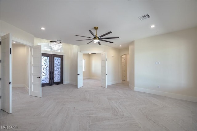 1525 Heights Dr, Logandale, NV 89021 - foyer with french doors, arched walkways, a ceiling fan, and recessed lighting