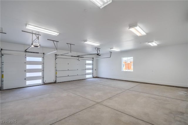 1525 Heights Dr, Logandale, NV 89021 - garage featuring a garage door opener and baseboards