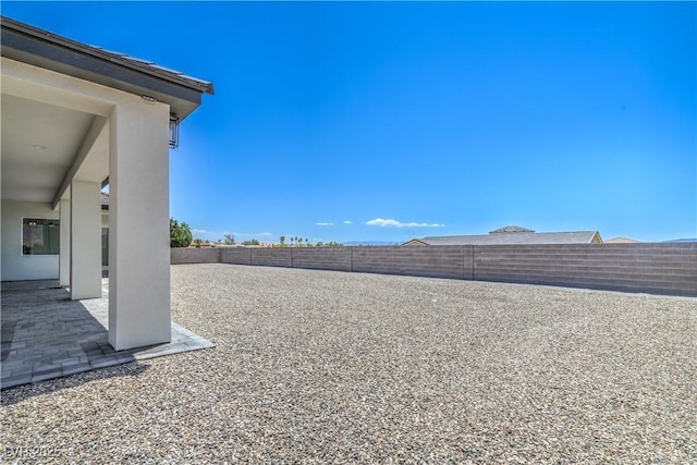 1525 Heights Dr, Logandale, NV 89021 - fenced backyard featuring a patio area