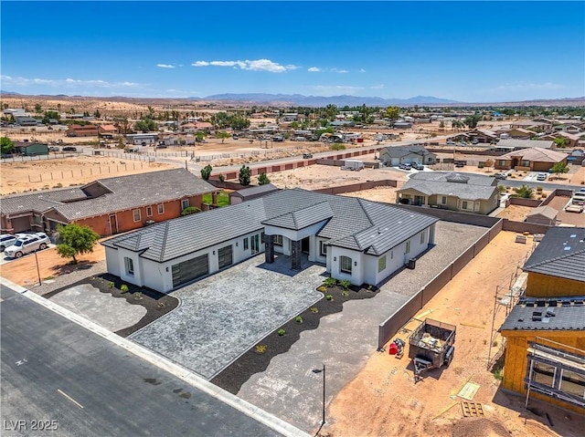 1525 Heights Dr, Logandale, NV 89021 - aerial perspective of suburban area with a mountain backdrop