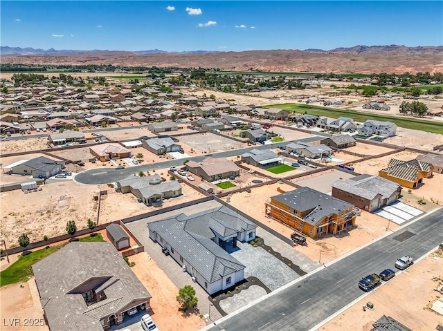 1525 Heights Dr, Logandale, NV 89021 - aerial perspective of suburban area featuring a mountainous background
