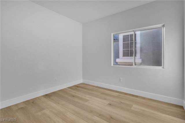 10200 Wood Work Ln, Las Vegas, NV 89135 - empty room featuring baseboards and wood finished floors