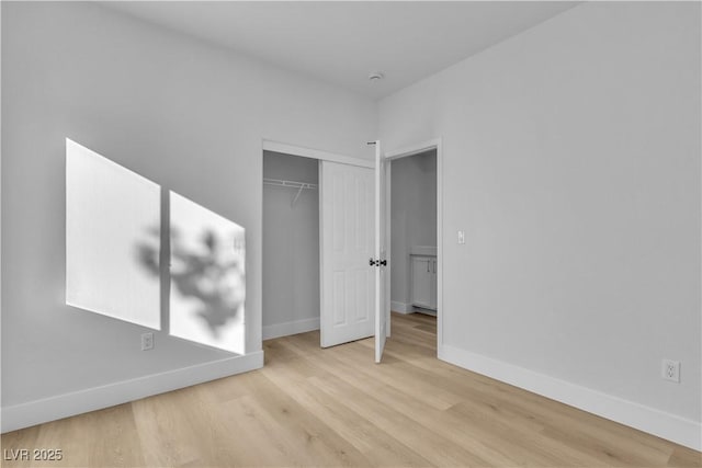 10200 Wood Work Ln, Las Vegas, NV 89135 - unfurnished bedroom featuring wood finished floors and a closet