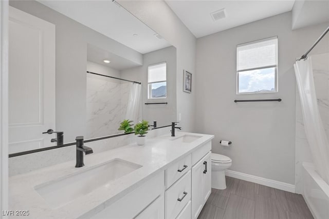 12426 Alpenglow Ct, Las Vegas, NV 89138 - full bathroom with double vanity and shower / bath combination with curtain