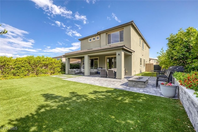 12426 Alpenglow Ct, Las Vegas, NV 89138 - rear view of property with stucco siding, a patio area, and an outdoor living space with a fire pit